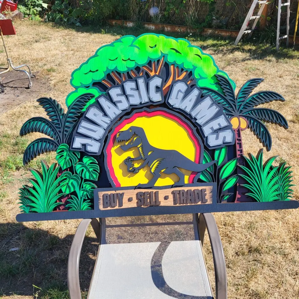 Colorful Jurassic Games sign design.